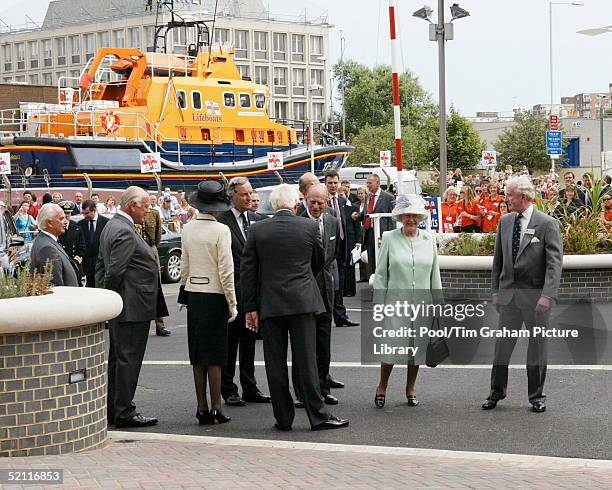 The Queen, Accompanied By The Duke Of Edinburgh And The Duke Of Kent During A Walkabout Before Formally Opening The Royal National Lifeboat...