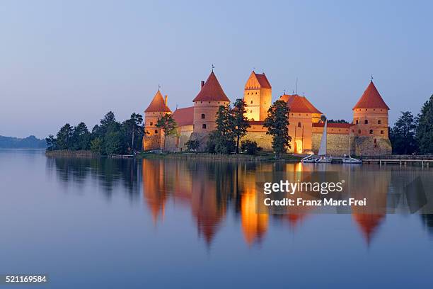 trakai island castle in galve lake - lithuania stock pictures, royalty-free photos & images
