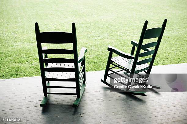rocking chairs on porch - rocking chair stock pictures, royalty-free photos & images