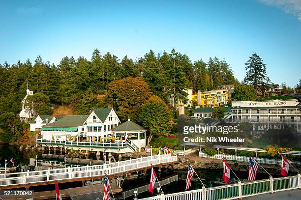 The historic 19C Hotel de Haro and waterfront restaurant overlook the picturesque marina of Roche Harbor on the northern tip of San JaunIsland in the...