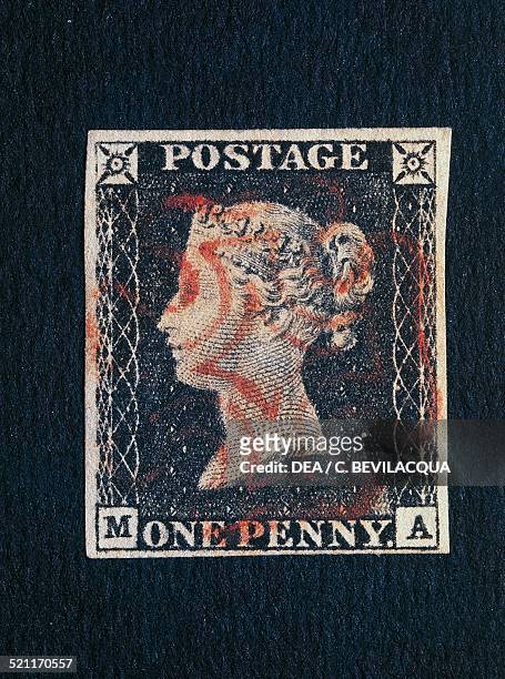 One Penny black with portrait of Queen Victoria , 1st postage stamp issued in the world. United Kingdom, 20th century. United Kingdom