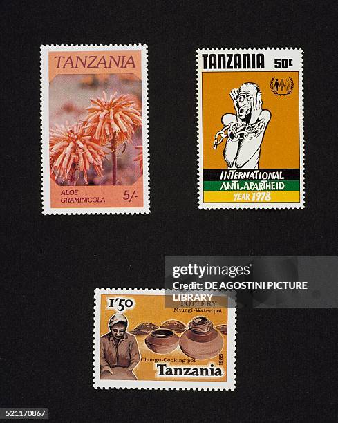 Top from left, postage stamp from the Indigenous Flowers series Aloe graminicola; postage stamp commemorating the International anti-apartheid year,...