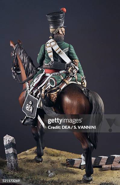 Officer of the 1st Eclaireurs regiment of the Imperial Guard 5.4 cm, toy soldier from the Napoleonic era, made by Danilo Cartacci. France, 19th...