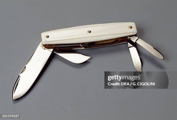 Multi-purpose folding knife with mother of pearl handle. 20th century. Unspecified