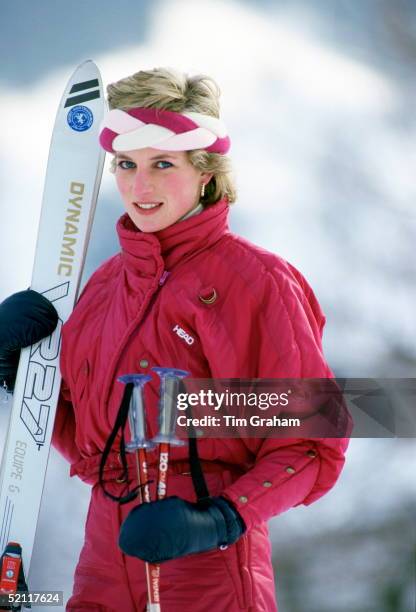 Princess Diana Holding Her Skis And Poles During A Holiday In Klosters, Switzerland Wearing A Skisuit By Head And A Braided Headband