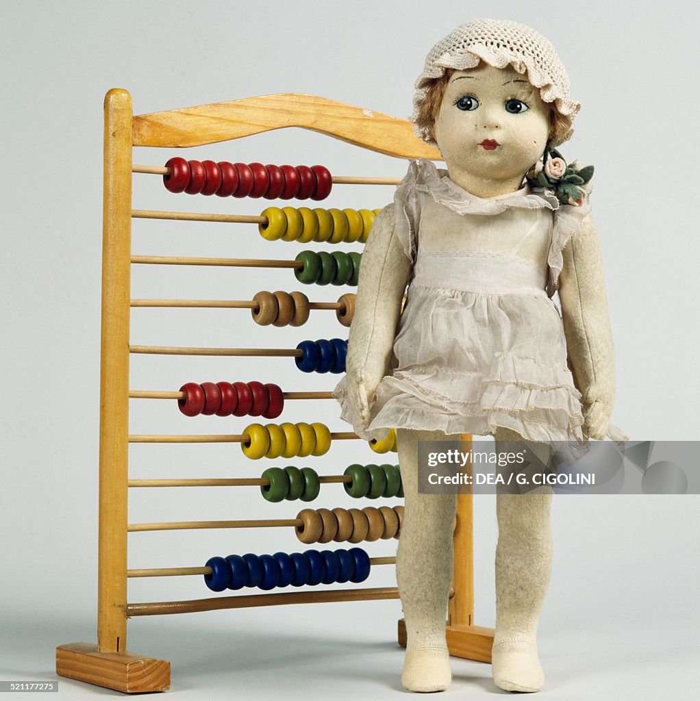 Doll with abacus...
