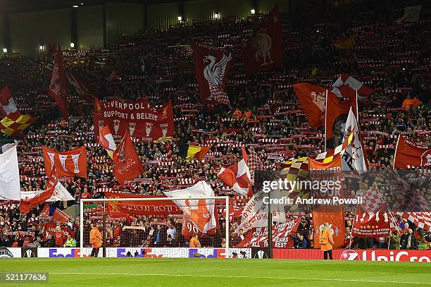 Fans of Liverpool hold banners and flags before the UEFA Europa League Quarter Final: Second Leg match between Liverpool and Borussia Dortmund at...