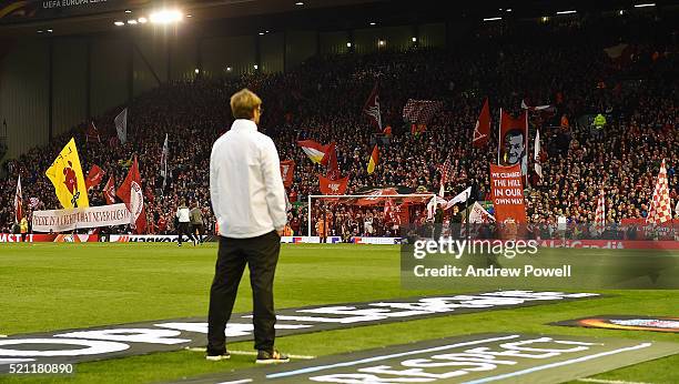 Jurgen Klopp manager of Liverpool watches the Kop stand before the UEFA Europa League Quarter Final: Second Leg match between Liverpool and Borussia...