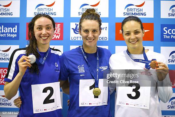 Jazmin Carlin of Great Britain poses with Eleanor Faulkner and Keri-Anne Payne after winning the Women's 800m Freestyle Final on day three of the...