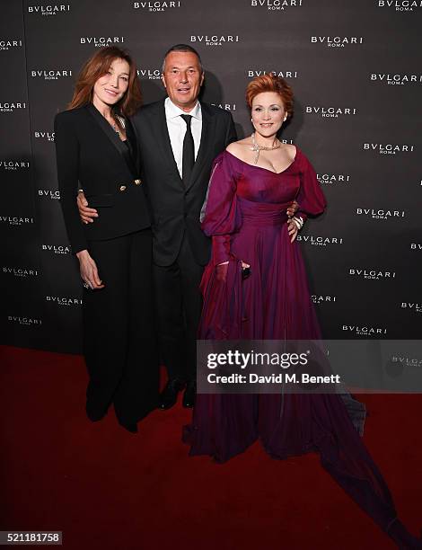 Carla Bruni, wearing Bulgari jewellery,, Jean Christophe Babin, Bulgari CEO, and Carmen Giannattasio, wearing Bulgari jewellery, arrive at the...