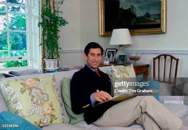 Prince Charles Sitting In His Living Room At Home In Highgrove House.