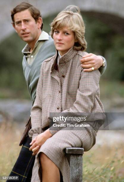 Prince Charles With His Arm Around Princess Diana As They Sit On A Style During Their Honeymoon At Balmoral In Scotland.the Princess Is Wearing A...