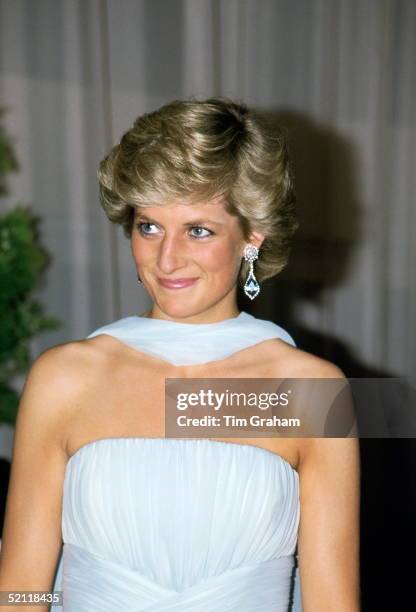 Princess Diana Attending The Film Festival In Cannes Wearing A Pale Blue Chiffon Dress And Wrap Designed By Fashion Designer Catherine Walker