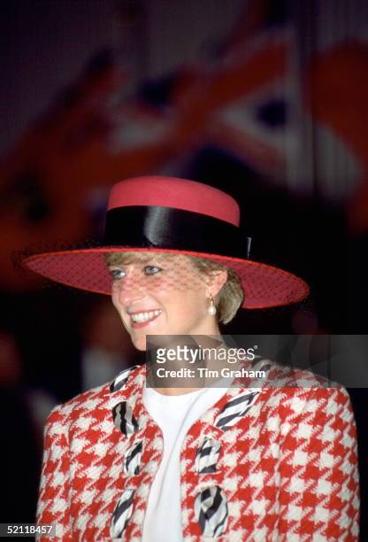 Princess Diana Looking Happy And Smiling During A Royal Tour In Canada. She Is Wearing A Red And Black Houndstooth Suit Designed By Fashion Designer...