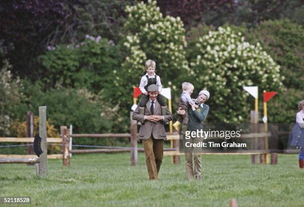 Zara And Peter Phillips With Their Mother, Princess Anne, At The Royal Windsor Horse Show. Peter Is On Shoulders Of Bodyguard David Robinson
