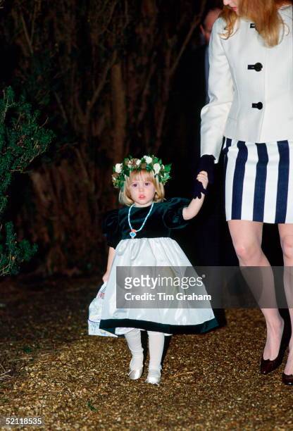 Princess Beatrice, In A Bridesmaid's Outfit, Holding Her Mother's Hand As They Attend The Wedding Of Lulu Blacker Who Is A Close Friend Of Susan...