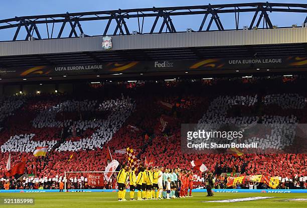 The teams line up as Liverppol fans display the number 96, the number of people who lost their lives in the Hillsborough disaster during the UEFA...