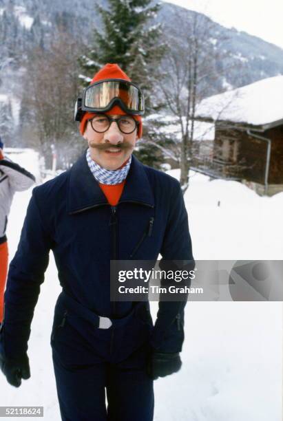 Prince Charles Wearing Joke Mask To Tease Press Photographers During A Skiing Holiday In Klosters, Switzerland