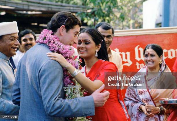 Prince Charles, Prince of Wales is welcomed, by Indian actress Padmini Kolhapure , to the Rajkamal Kalamandir film studio for a visit, Bombay, India,...
