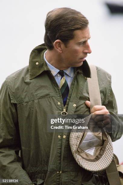 Prince Charles In Barbour Style Waxed Jacket And Tweed Cap On Holiday In Scotland