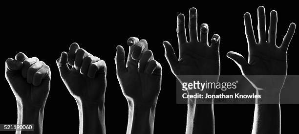 digital composite of man's hand in five movement stages, black background - five people stock pictures, royalty-free photos & images