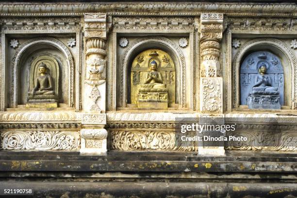 statue of lord buddha at unesco world heritage mahabodhi temple, bodhgaya, bihar, india - world heritage mahabodhi stock pictures, royalty-free photos & images