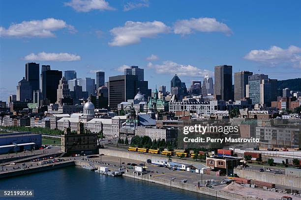 old port and montreal skyline - hotel de ville montreal stock pictures, royalty-free photos & images