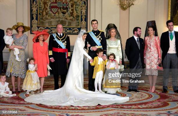 Crown Prince Felipe Of Spain, Prince Of The Asturias, With His Bride Crown Princess Letizia In The Royal Palace After Their Wedding With Bridesmaids...