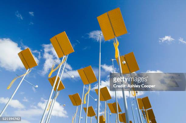 solar panels and wind turbines - kingston upon hull stock-fotos und bilder