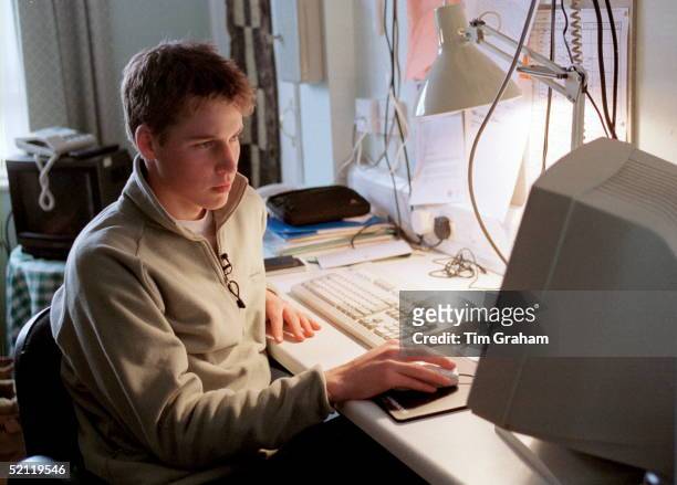 Prince William Using His Computer At His Desk At Eton College Boarding School