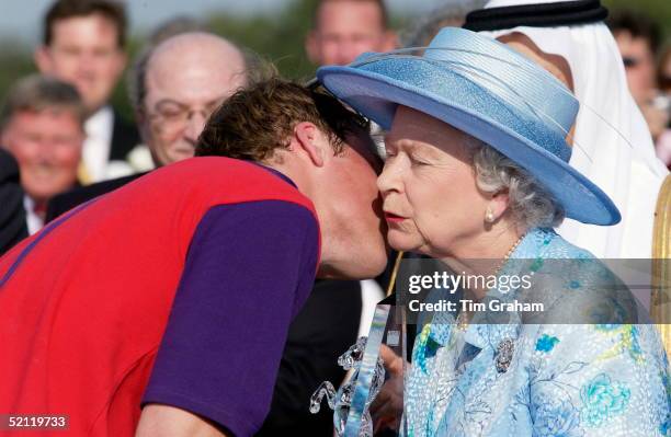 Prince William Kisses His Grandmother Queen Elizabeth II As She Presents Him With A Prize After His Polo Match