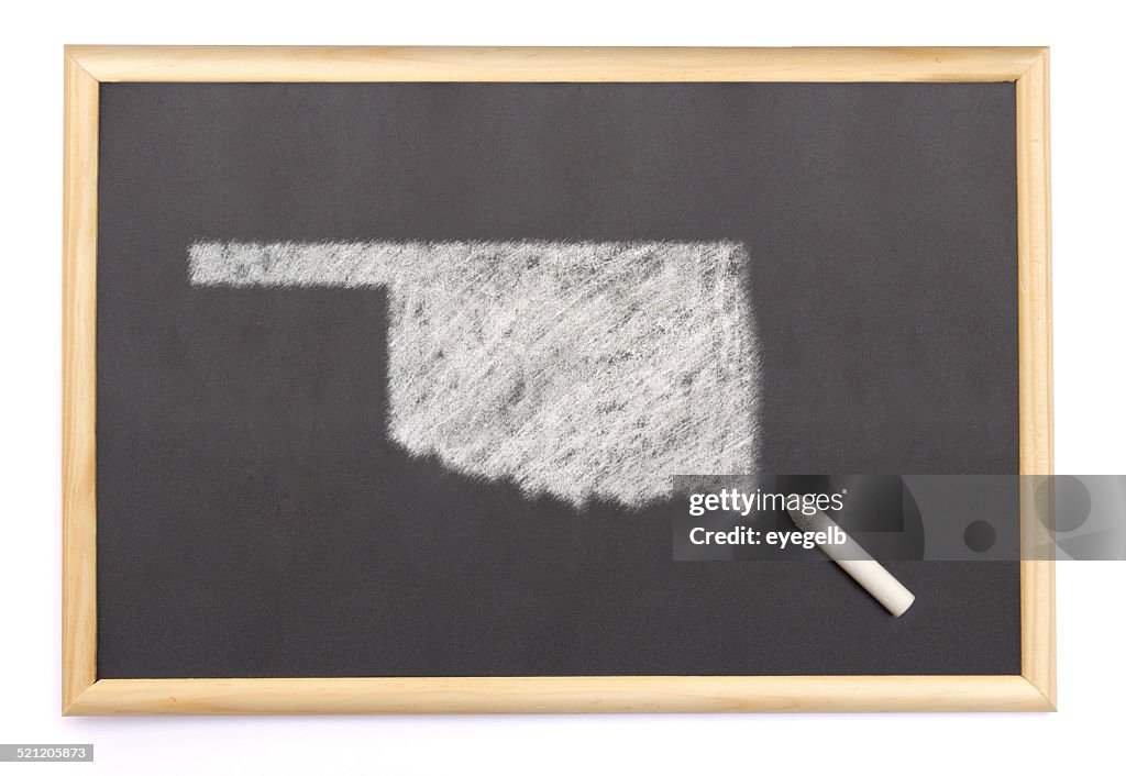 Blackboard with the shape of Oklahoma drawn onto.