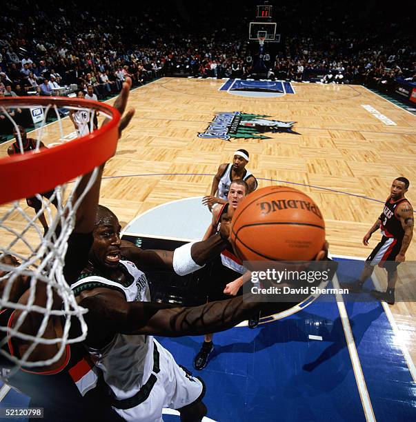 Kevin Garnett the Minnesota Timberwolves shoots during the game with the Portland Trail Blazers at Target Center on January 15, 2005 in Minneapolis,...