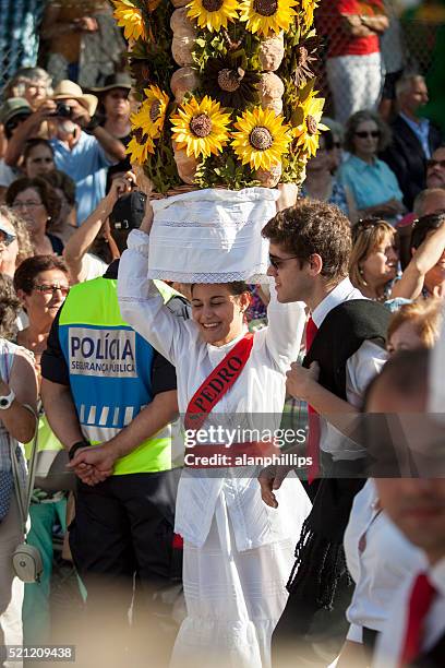 woman and chaparone in tray festival - tomar, portugal - tomar stock pictures, royalty-free photos & images