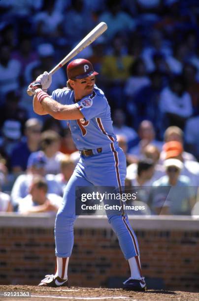 Mike Schmidt of the Philadelphia Phillies readies for the pitch during a 1988 season game against the Cubs at Wrigley Field in Chicago, Illinois.