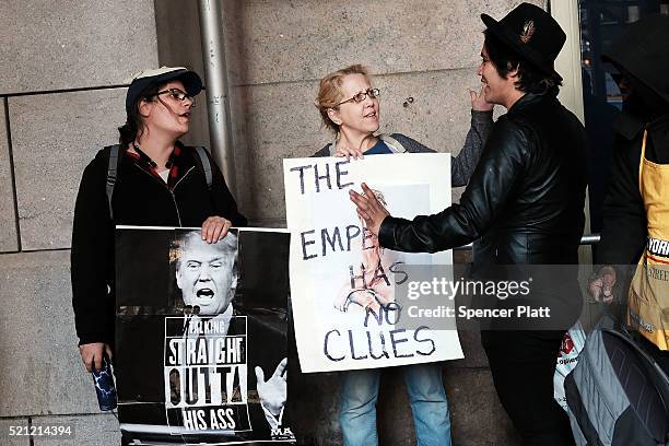 Dozens of protesters and activists gather outside of a midtown hotel which is hoisting a black-tie fund-raiser for the state Republican Party on...