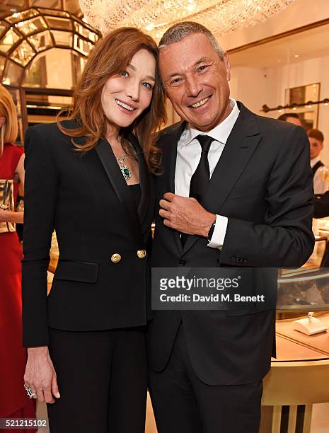 Carla Bruni, wearing Bulgari jewellery, and Bulgari CEO Jean Christophe Babin attend the Bulgari flagship store reopening on New Bond Street on April...