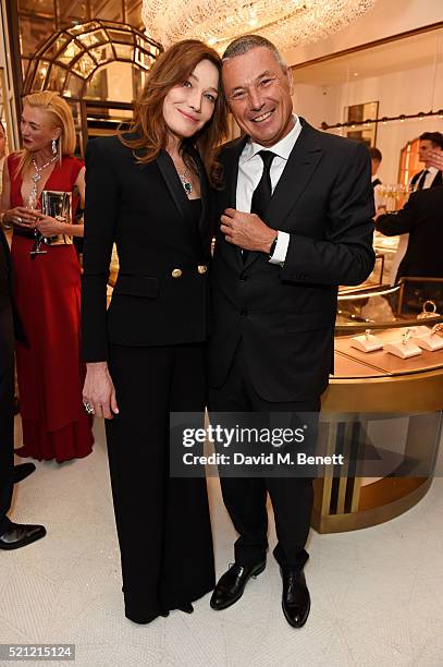 Carla Bruni, wearing Bulgari jewellery, and Bulgari CEO Jean Christophe Babin attend the Bulgari flagship store reopening on New Bond Street on April...