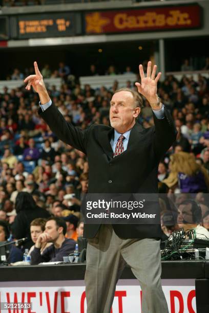 Rick Adelman, head coach for the Sacramento Kings, relays a call from the bench against the Seattle SuperSonics during the game on February 1, 2005...