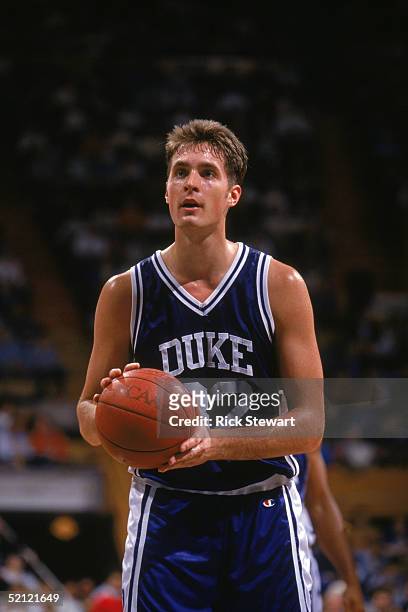 Christian Laettner of the Duke University Blue Devils prepares to shoot a free throw during a NCAA game against Canisius College in December 7, 1991.