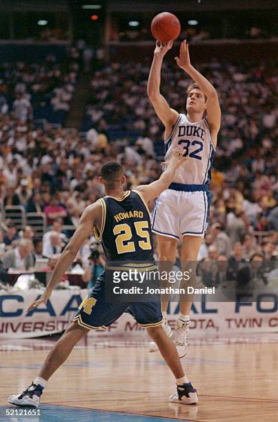 Christian Laettner of the Duke University Blue Devils shoots a jump shot during a game in the NCAA Final Four tournament.