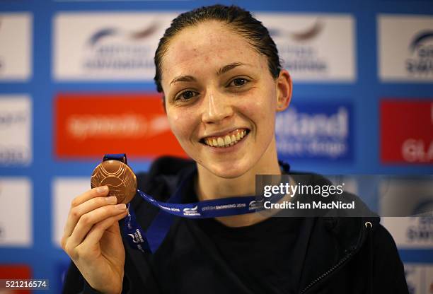 Rachel-Louise Masson poses with her bronze medal from the Women's 50m Freestyle during Day Three of The British Swimming Championships at Tollcross...