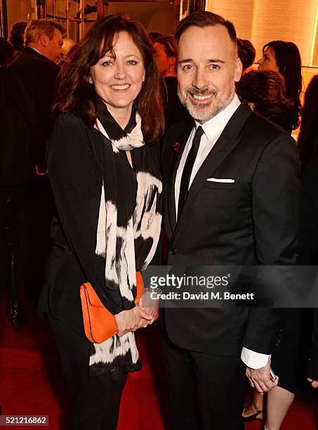 Anne Aslett and David Furnish, wearing a Bulgari watch, attend the Bulgari flagship store reopening on New Bond Street on April 14, 2016 in London,...