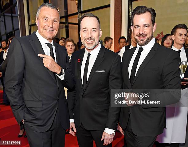 Bulgari CEO Jean Christophe Babin, David Furnish, wearing a Bulgari watch, and Stephane Gerschel arrive at the Bulgari flagship store reopening on...