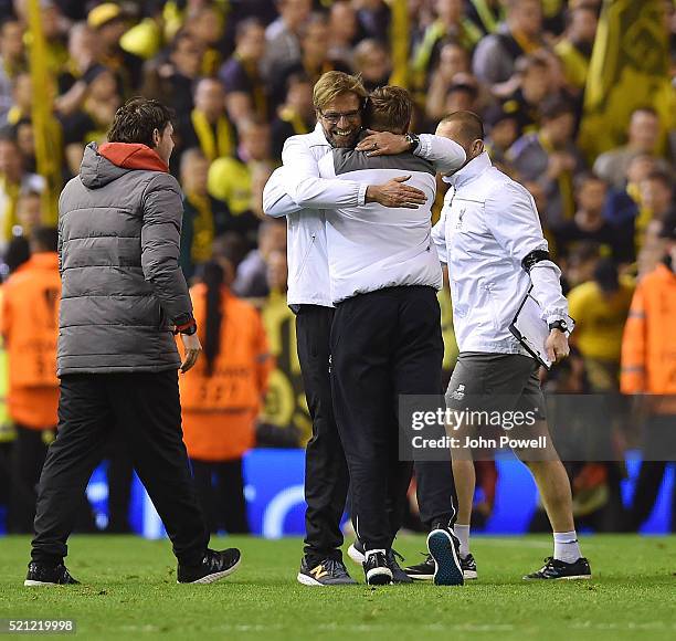 Jurgen Klopp manager of Liverpool embraces a member of his team at the end of the UEFA Europa League Quarter Final: Second Leg match between...