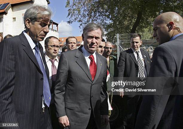 German President Horst Koehler accompanies local mayor Eli Moyal visits the scene of a fatal Palestinian Qassam rocket attack next to a Jewish...