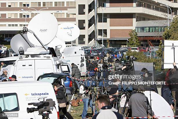 News media satellite dishes and trucks crowd outside the Policlinico Gemelli hospital in Rome, 02 February 2005. Pope John Paul II was said to be in...