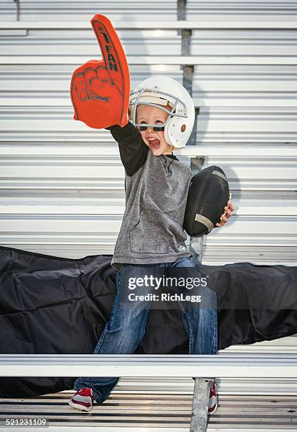 little boy football fan - foam hand stock pictures, royalty-free photos & images