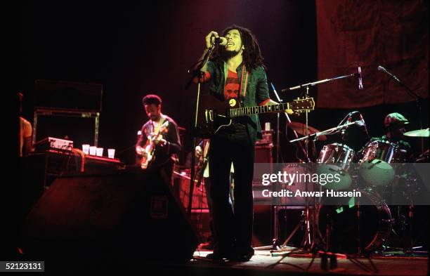 Jamaican reggae legend Bob Marley performs live on stage in June 1977 at the Hammersmith Odeon, London, England.