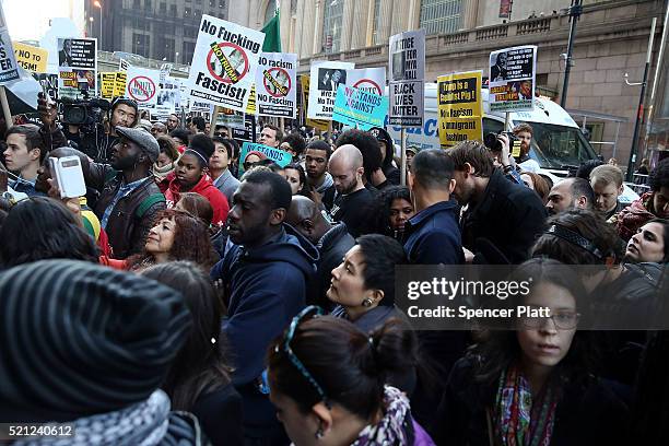 Hundreds of protesters and activists march during a demonstration near a midtown hotel which is hosting a black-tie fund-raiser for the state...